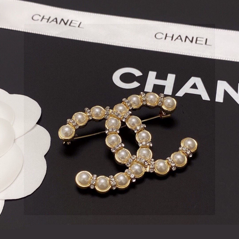Ch*el brooches